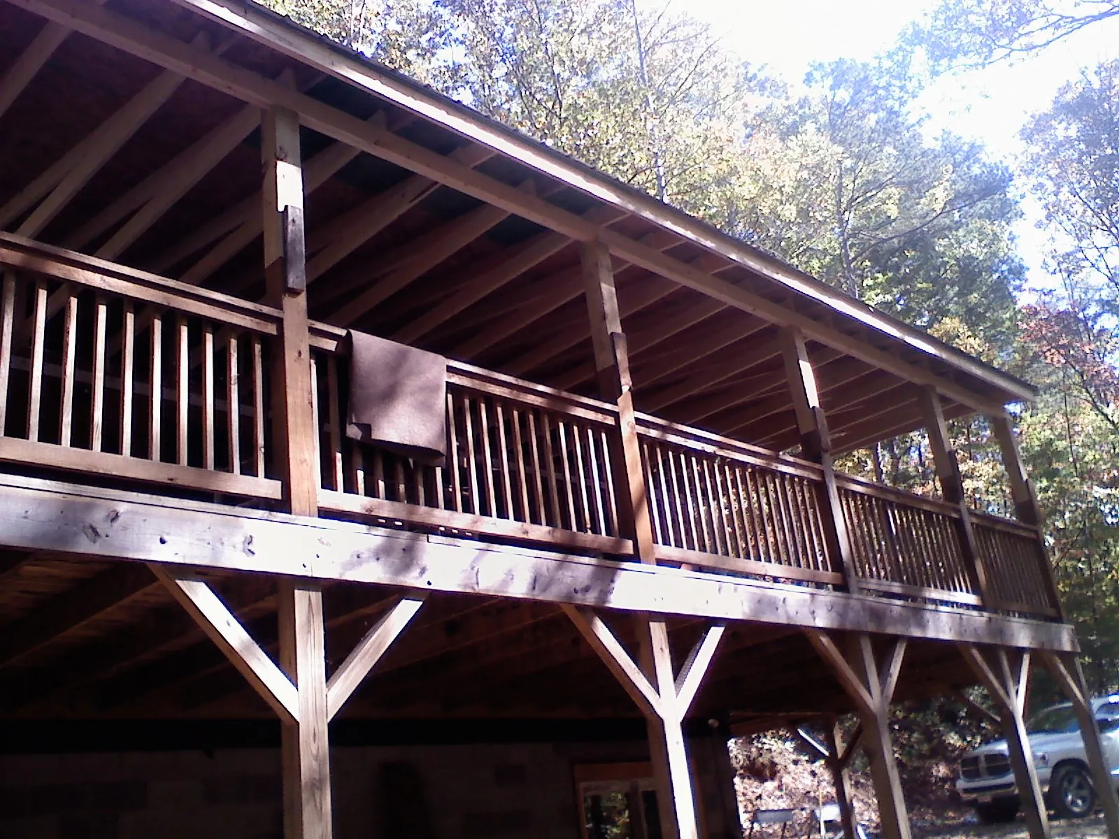 Timber framing under a new elevated porch and deck — Roof Leak Repair in Alleman by Roofing Brothers